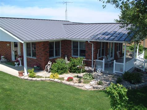 red brick house with grey metal roof|metal roofs on brick houses.